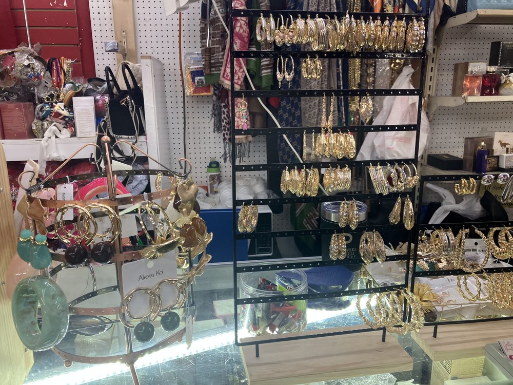 Gold hoop earring wall display