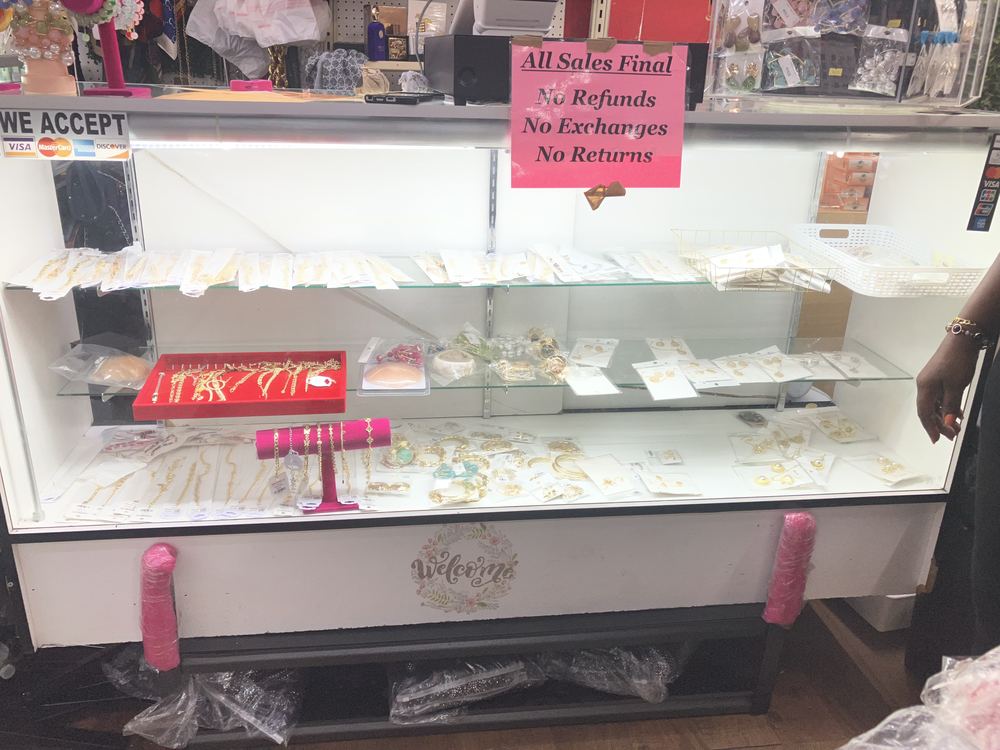 Gold-tone jewelry counter display