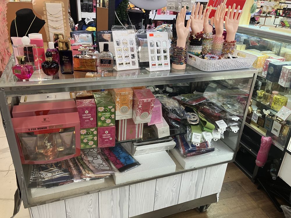Perfumes, bracelets and earrings display